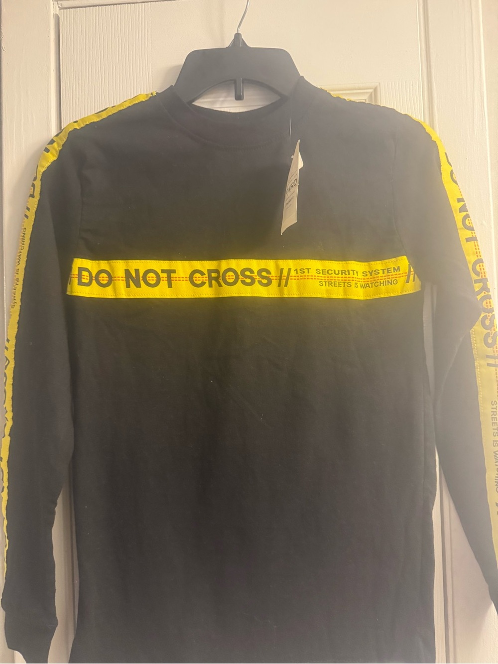Black Long Sleeve Shirt with Yellow "Do Not Cross" Tape Detail